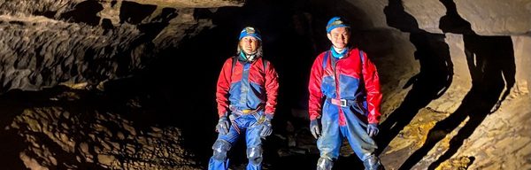 Cavers Exploring Derbyshire Cave