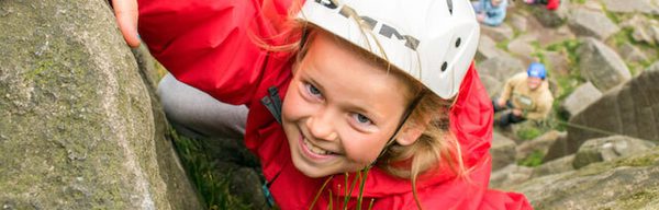 School Girl Rock Climbing