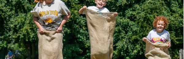 Summer of play at Ilam Park sack race jpg